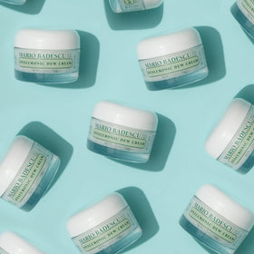 Mario Badescu jar on bathroom shelf as part of daily routine for consistent hydration