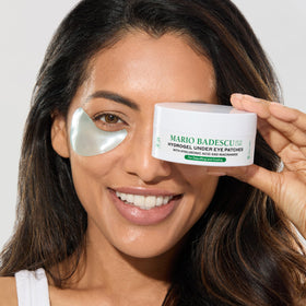 Mario Badescu under-eye patches applied demonstrating cooling effect