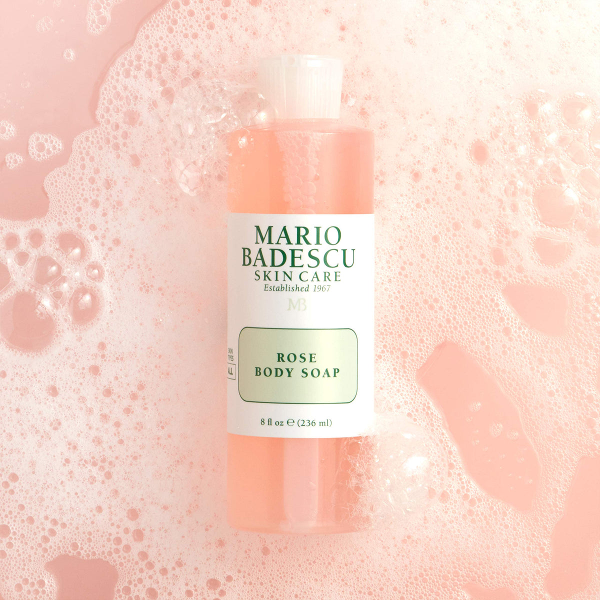 Mario Badescu pump close-up dispensing rose shower gel, precise application and easy use