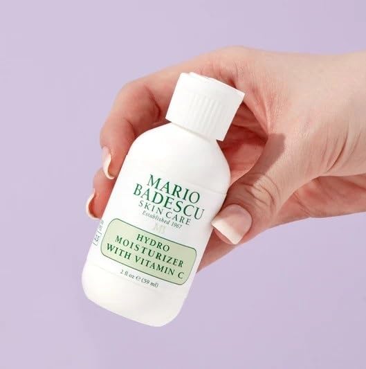 Mario Badescu 2 fl oz jar beside ruler for size comparison, conveys travel-friendly compact convenience