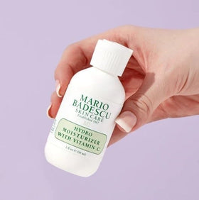 Mario Badescu 2 fl oz jar beside ruler for size comparison, conveys travel-friendly compact convenience