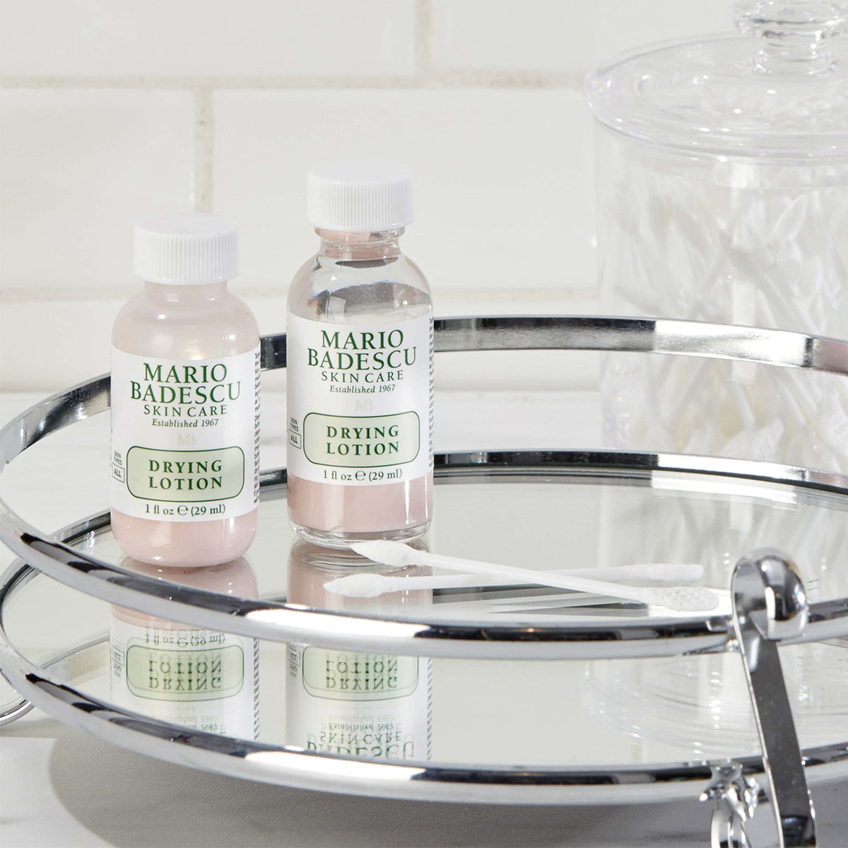 Mario Badescu size comparison beside coin showing travel-friendly one ounce bottle