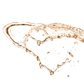 Mario Badescu nozzle close-up showing fine mist spray action and even coverage