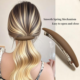 Markuii barrette securing a half-up hairstyle useful for everyday secure styling