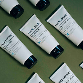 MARLOWE. product styled on bathroom shelf, conveying elevated everyday grooming