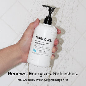 MARLOWE. bottle in hand illustrating true 15 oz size and portability