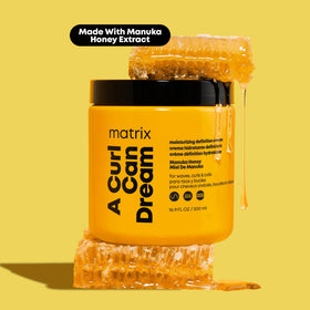 MATRIX applied to wet curls showing detangling and even product distribution