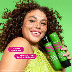 MATRIX creamy conditioner texture close-up showing slip for easy detangling and hydration