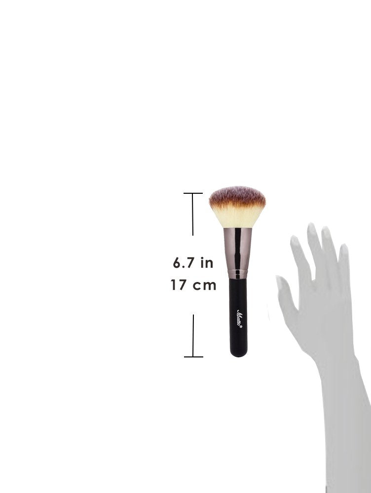 Matto brush in use buffing mineral powder for a smooth blended finish