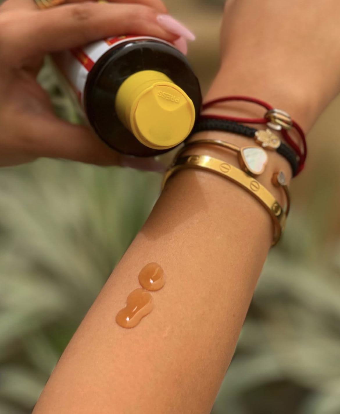 Maui Island Secret being applied to skin demonstrating lightweight absorption