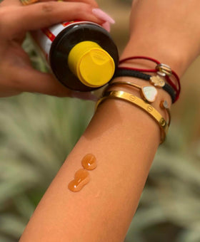 Maui Island Secret being applied to skin demonstrating lightweight absorption