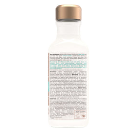 Lifestyle shot of Maui Moisture bottle on bathroom shelf suggesting daily scalp care routine