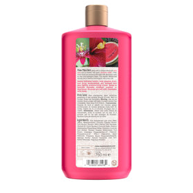 maui moisture 25.4 fl oz bottle beside common items to show scale