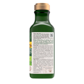 Maui Moisture bottle in shower demonstrating easy, sulfate-free wash