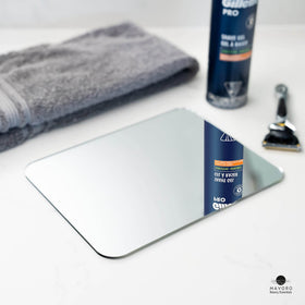 Mavoro mirror on back of door showing space-saving use and quick grooming benefit