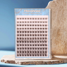 Mavphnee model wearing brown clusters demonstrating subtle natural enhancement