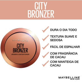 Maybelline bronzer next to hand to show compact size and travel-friendly convenience