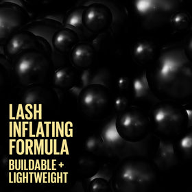 Maybelline Colossal Bubble product flatlay with makeup tools for styling