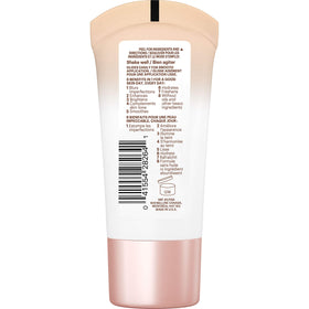 MAYBELLINE tube next to a coin demonstrating 1 fl oz travel-friendly size