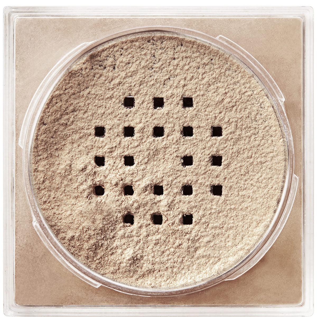 Maybelline Fit Me loose powder in a makeup bag lifestyle shot for on-the-go touchups