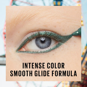 MAYBELLINE Galactic Cobalt held next to finger showing pencil scale and portability
