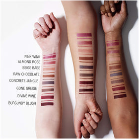 Maybelline next to matching lipstick showing how it prolongs lipstick wear