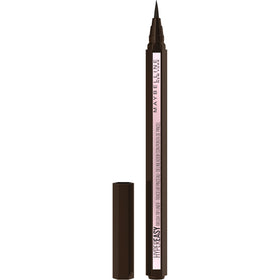 MAYBELLINE eyeliner next to coin showing compact size and travel-friendly benefit