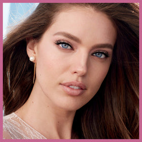 Maybelline model wearing mascara, natural fan effect enhances eyes