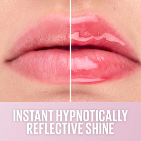 MAYBELLINE gloss on model lips demonstrating sheer coral tint and reflective shine