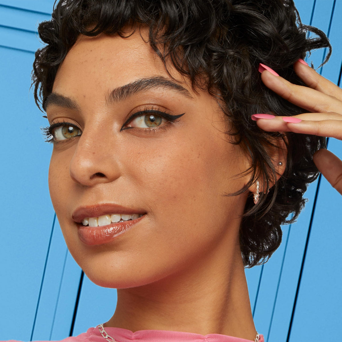 Maybelline demo stroke on skin illustrating smooth pigmented line