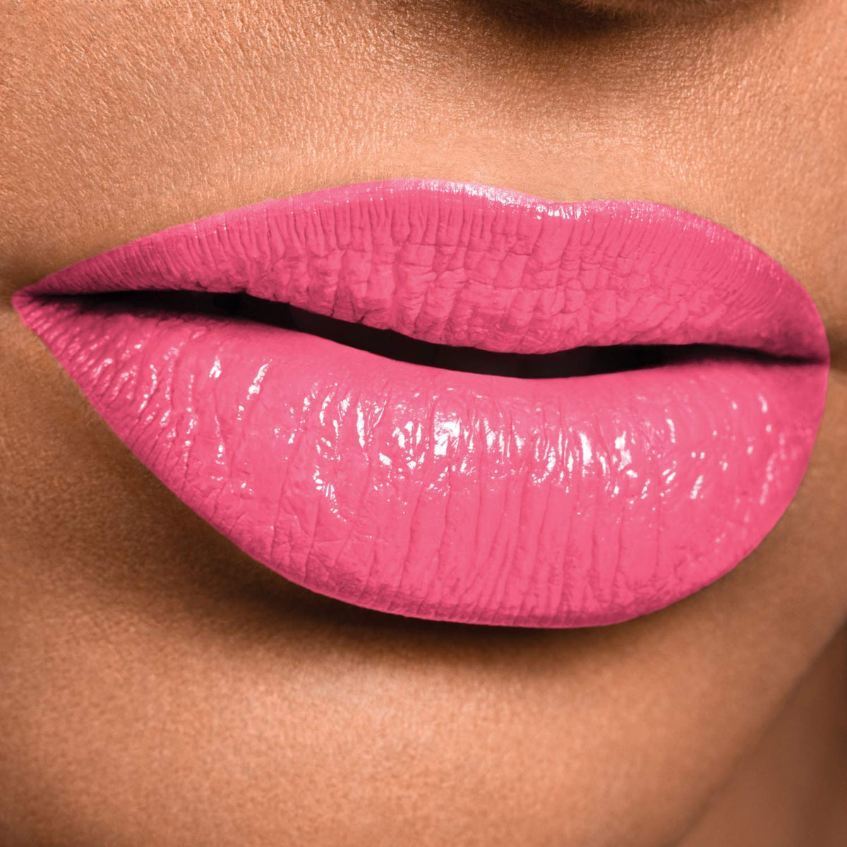 MAYBELLINE open tube revealing dual chambers for color and balm benefit