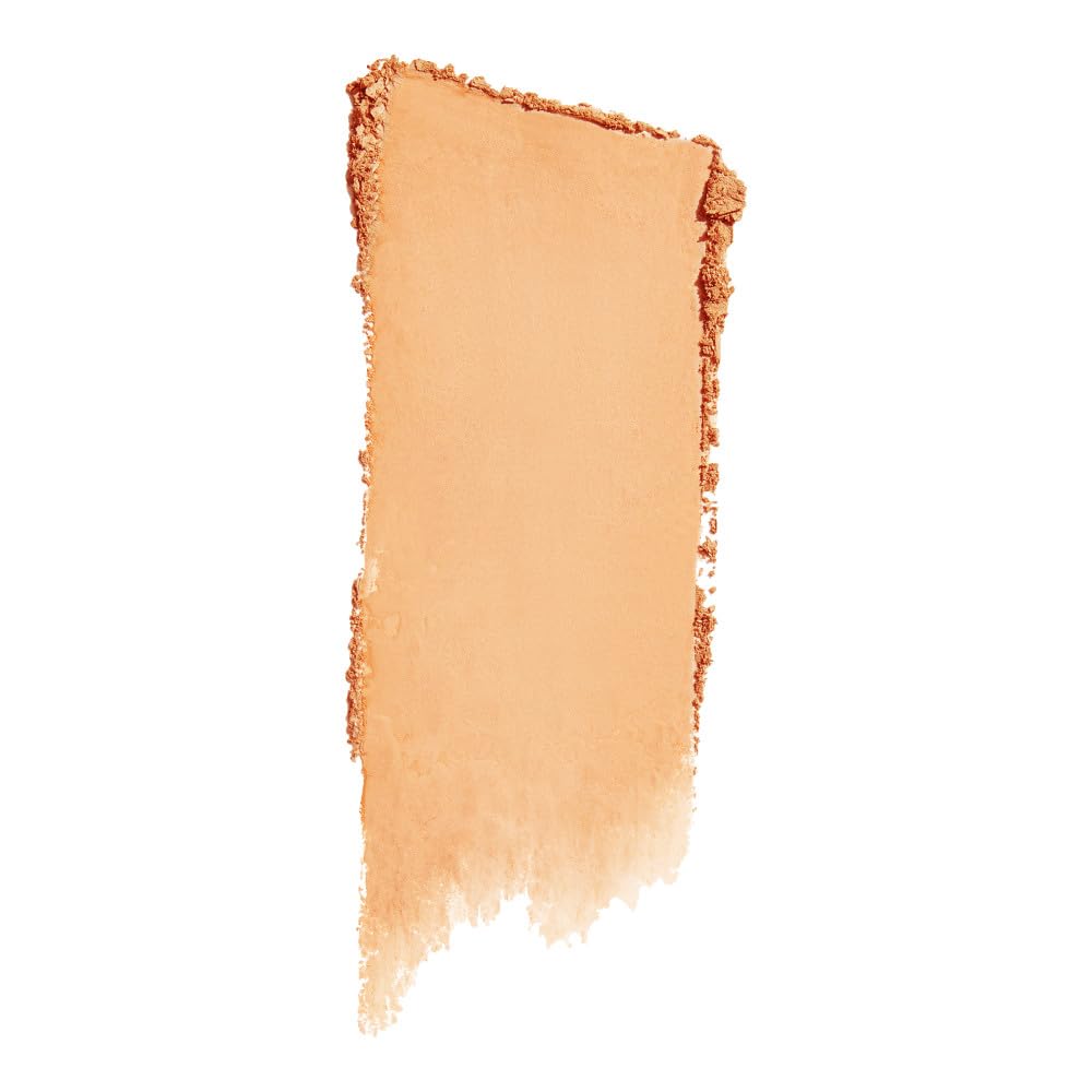 Maybelline applying powder with brush on cheek demonstrating coverage and natural look