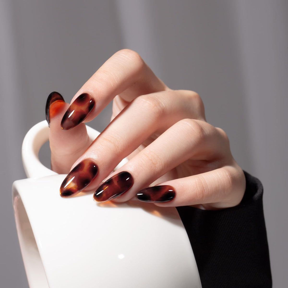MAYCHAO layered tortoise nail art demonstrating depth and customized patterns