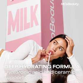 MCoBeauty toner in hand pressed onto skin demonstrating fast-absorbing hydration