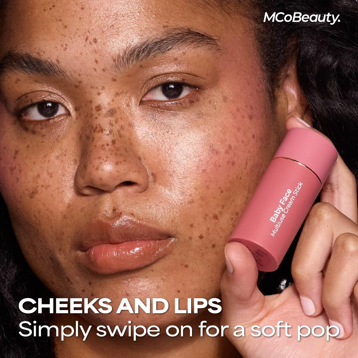 MCoBeauty stick in hand for scale illustrating pocket-ready portability