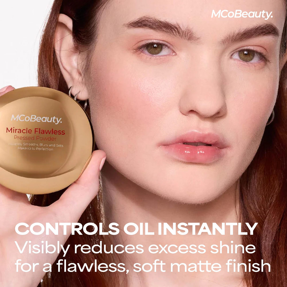 MCoBeauty powder applied with a fluffy brush for diffused, natural finish