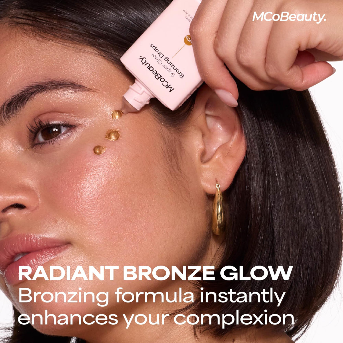 MCoBeauty dropper dispensing golden bronzing drop for precise application