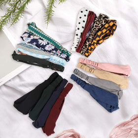 Meartchy floral and solid bands laid flat illustrating mix-and-match styling options