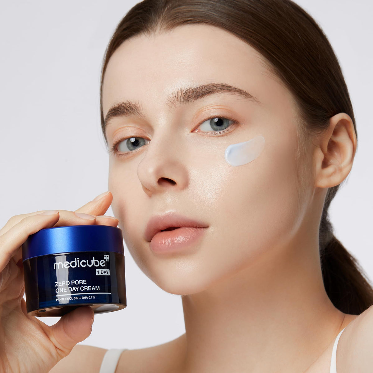 medicube open jar revealing cream consistency and readiness for daily pore care