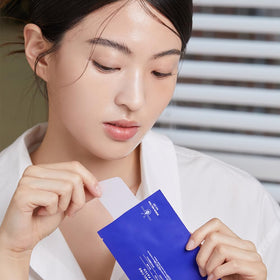 MEDIHEAL nose patch applied in use demonstrating coverage and visible impurity lifting