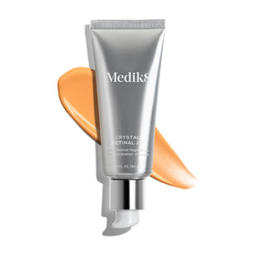 Medik8 Crystal Retinal 20 held in hand to show 1 oz scale and travel-friendly size benefit