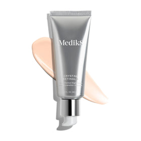 Medik8 applying serum to hand illustrating smooth spreadability and moisture benefit