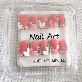 meemooron close-up of 3D flower and rhinestones highlighting decorative detail