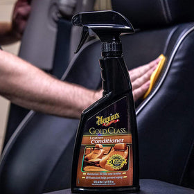 Meguiar's conditioned car interior showing restored leather appearance and protection