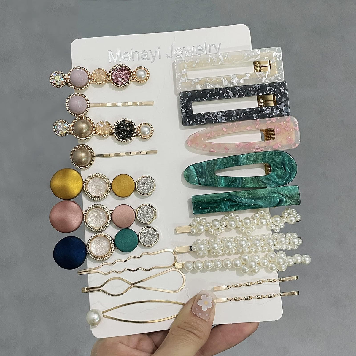 Mehayi acrylic barrette detail showing glossy finish and secure clasp