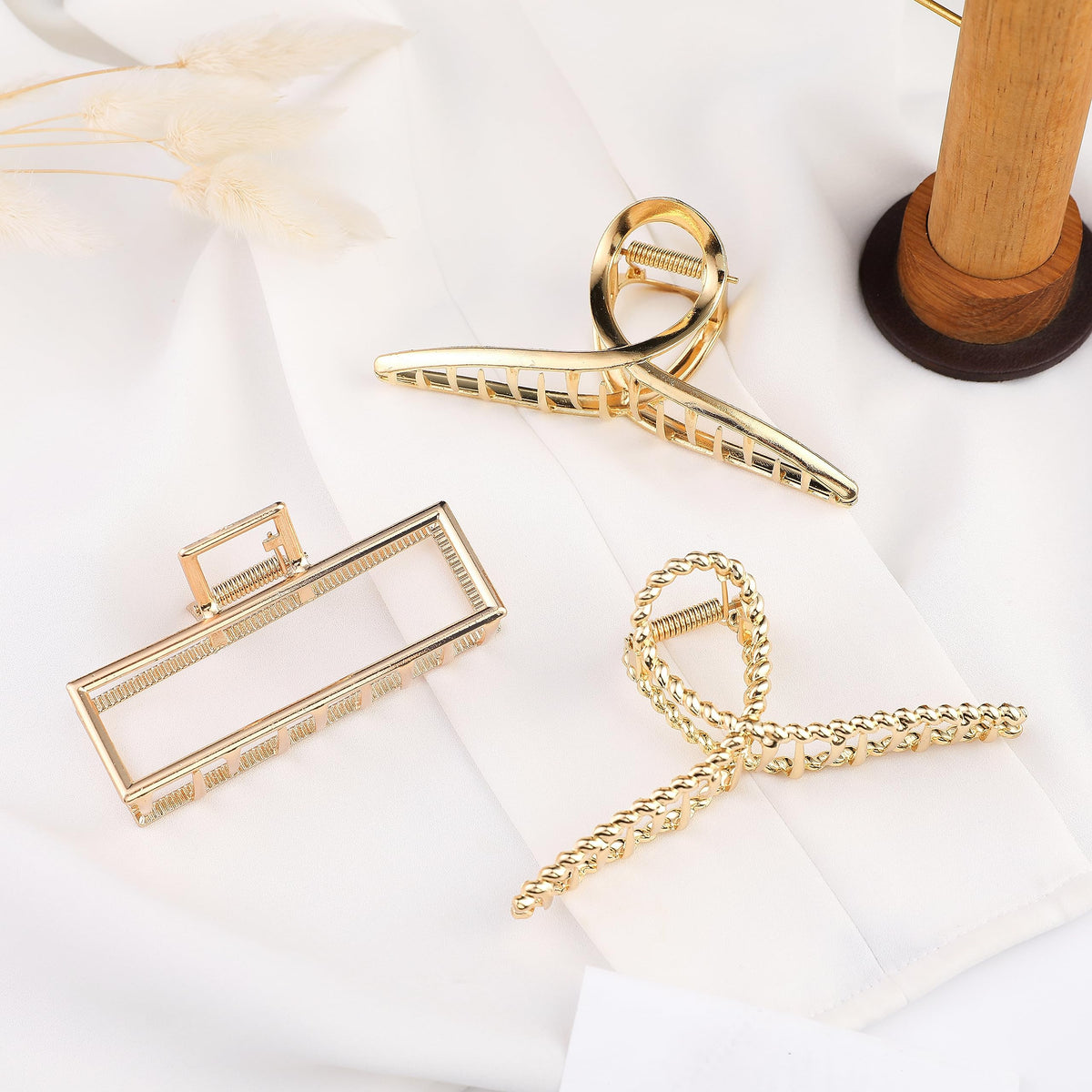 Mehayi clips flatlay with accessories showing versatile styling options