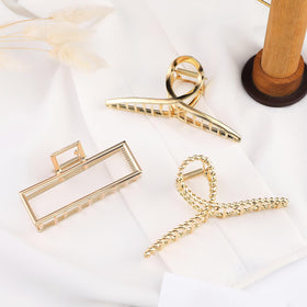 Mehayi clips flatlay with accessories showing versatile styling options