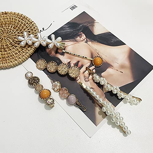 Mehayi flat lay of all 20 pieces illustrating mix of pearls, resin and pins