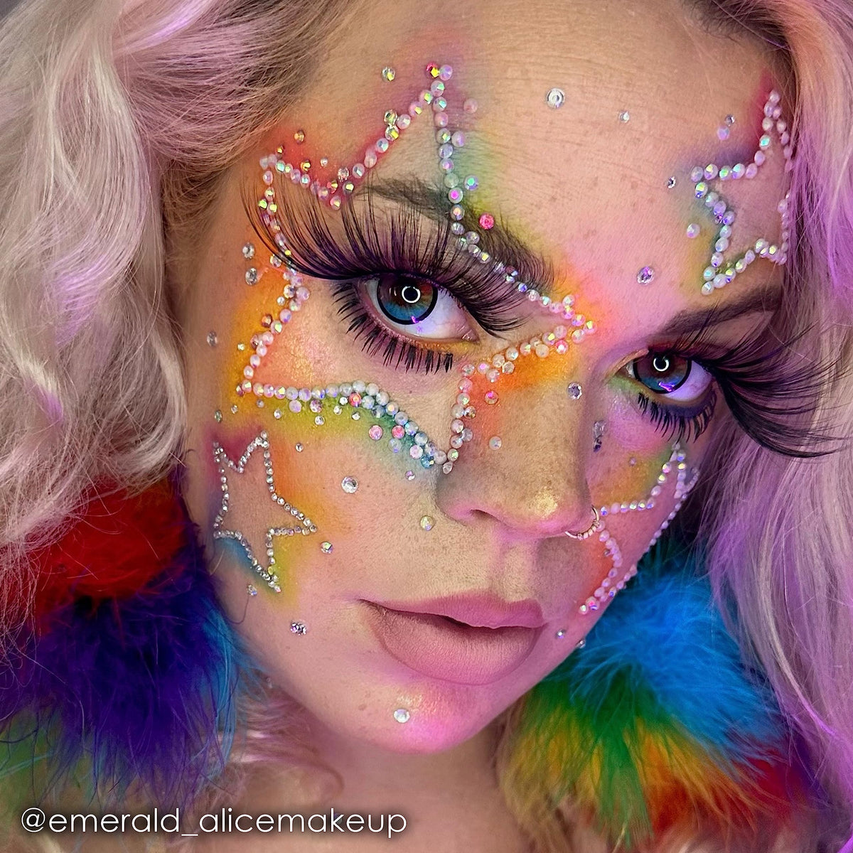 Mehron AdGem holding a rhinestone on skin for long-lasting sparkle