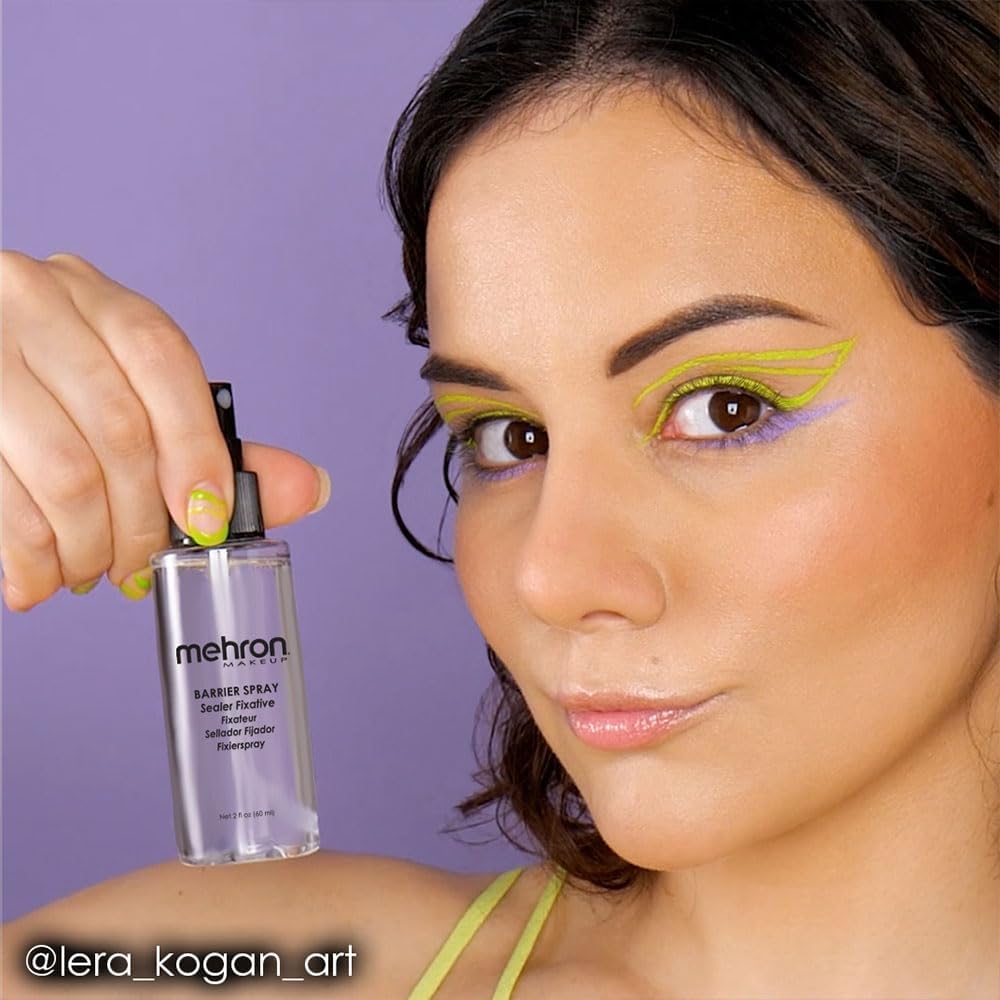 Mehron Barrier Spray next to a makeup kit showing professional use and convenience